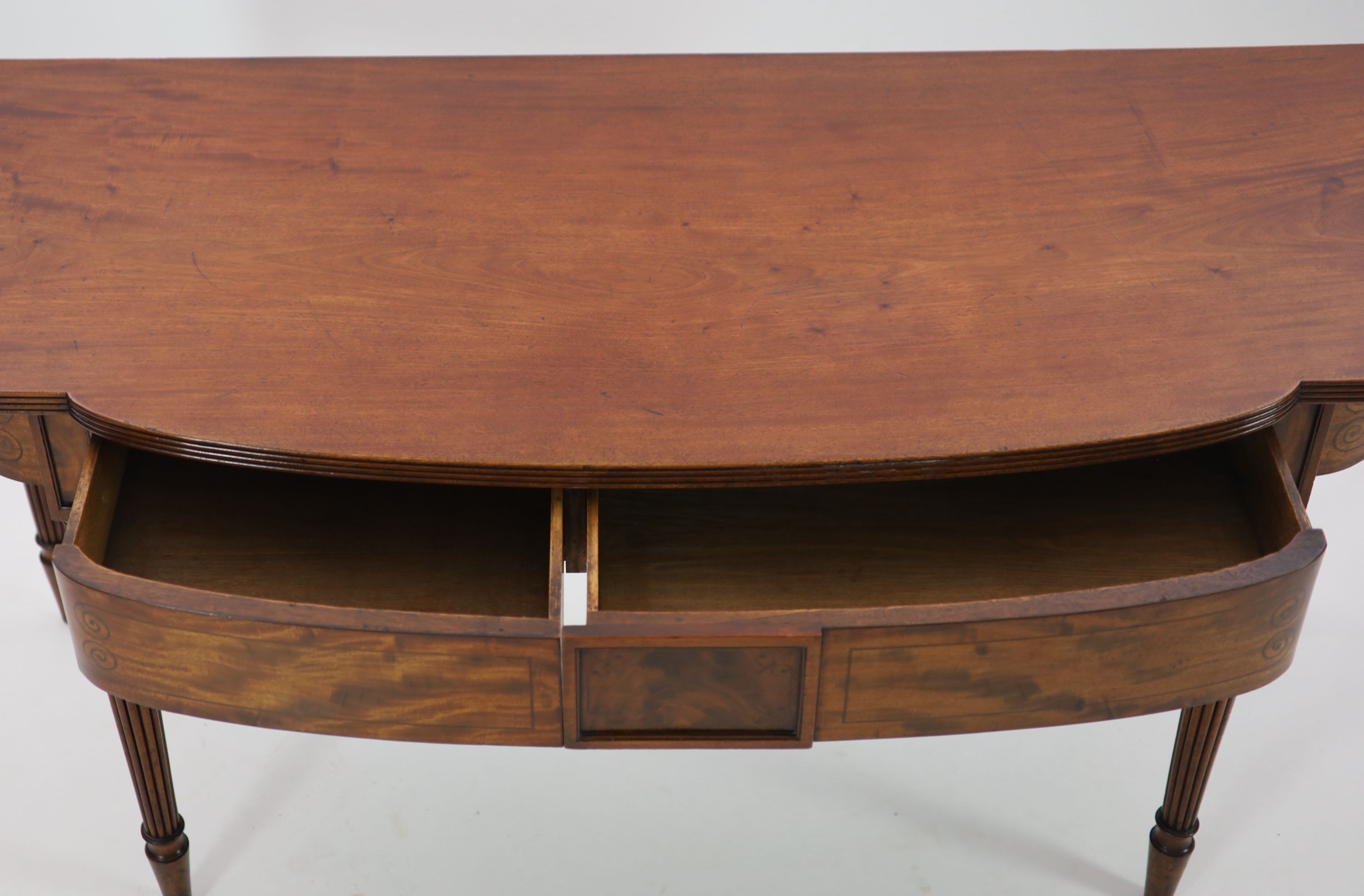 A Regency inlaid mahogany serving table, W.185cm D.75cm H.92cm